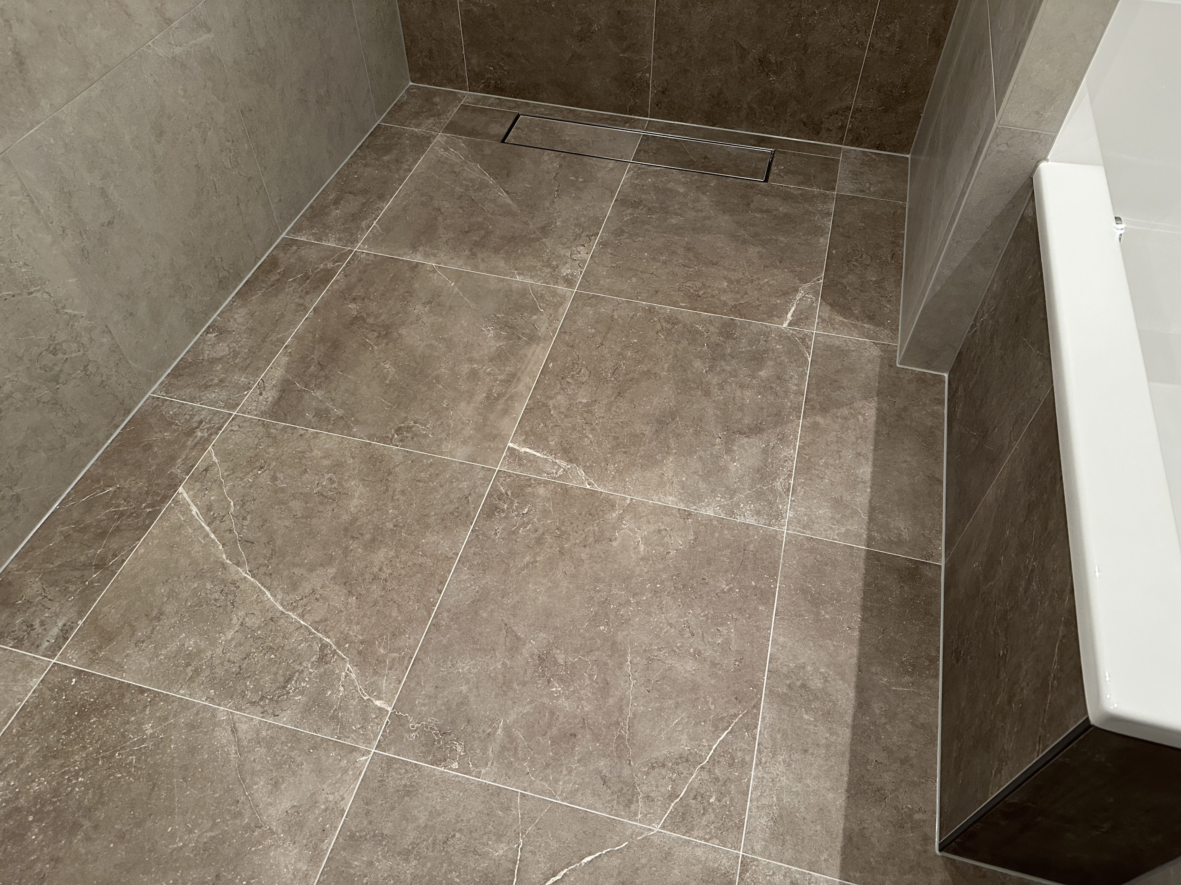 Badkamer renovatie 35 Amersfoort met warmteterugwin douchegoot